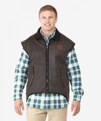 Brown | Swanndri Mens Foxton Wool Lined Oilskin Vest. Front view with hands by side