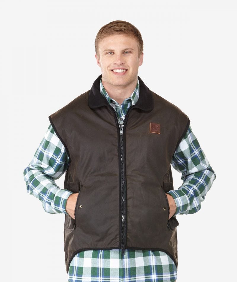 Brown | Swanndri Mens Foxton Wool Lined Oilskin Vest. Front View with hands in pockets