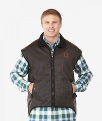 Brown | Swanndri Mens Foxton Wool Lined Oilskin Vest. Front View with hands in pockets