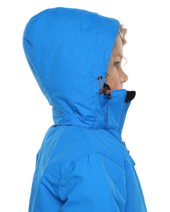 Bright Blue | XTM Kamikaze Kids Water Proof Jacket. Image depicts model wearing the bright blue colored jacket shown close up from the side with Hood on. Your Outdoor Store