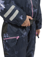 Navy Floral | XTM Akira Kids Snow Suit. Modeled Close up View of the hip pocket and mid section from side. Your Outdoor Store